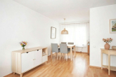 Essbereich - (KI generiert) - Betreutes Wohnen im Zentrum – helle 3-Zimmer-Wohnung mit Balkon