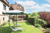 Ein Garten zum Entspannen - Gepflegtes Einfamilienhaus mit Panoramablick in Waldrandlage